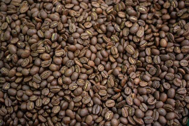 Coffee beans ready for the grinder background