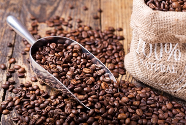 Coffee Beans in a Sack on wooden table