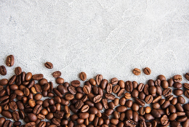 Coffee beans on a stone surface