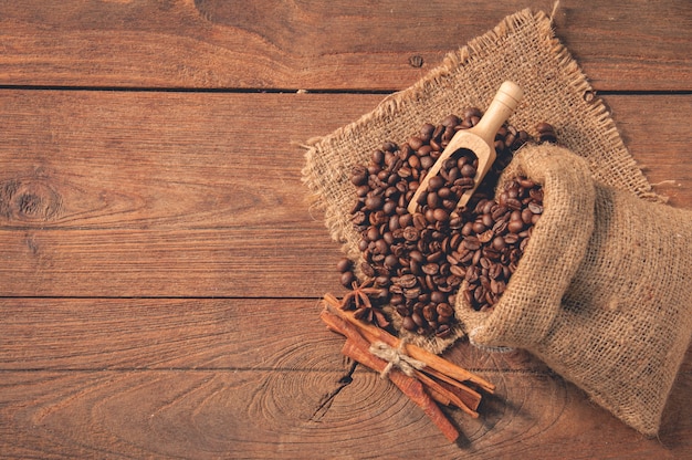 coffee beans on wooden table.