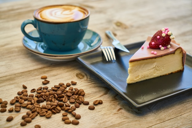 Coffee, cheesecake and cofee beans