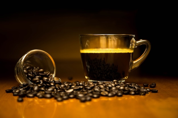 Coffee cup and coffee beans in high contrast 