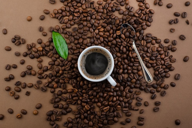 Coffee in a cup and coffee beans