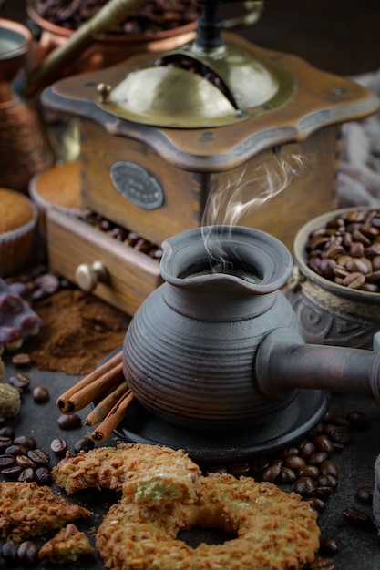 Coffee in a cup on coffee beans