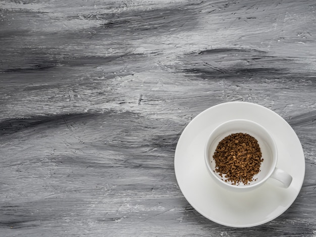 Coffee cup on grey background. Flat lay.Copy space.