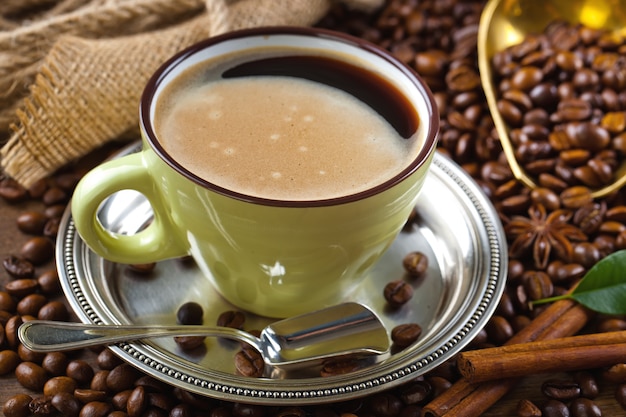 Coffee in a cup on an old background