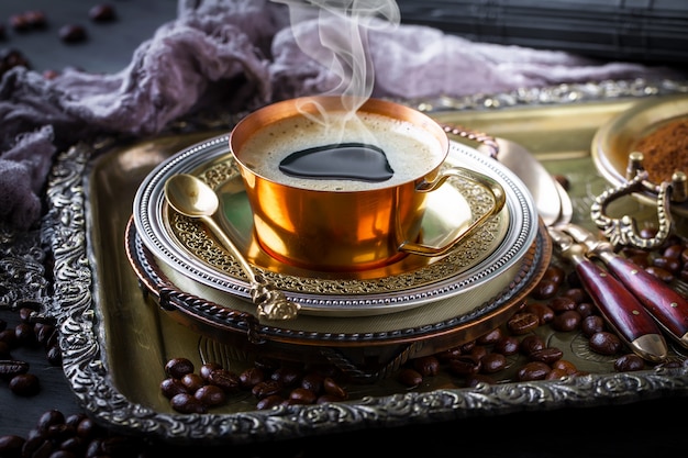 Coffee in a cup on an old surface