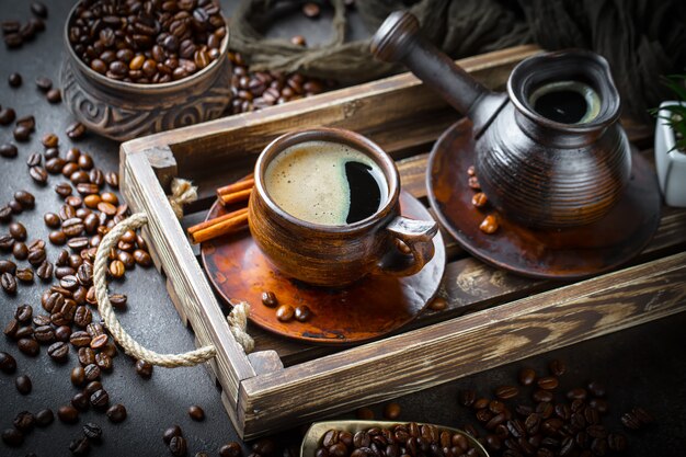 Coffee in a cup on an old surface