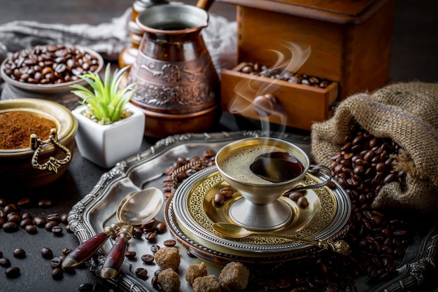 Coffee in a cup on an old surface