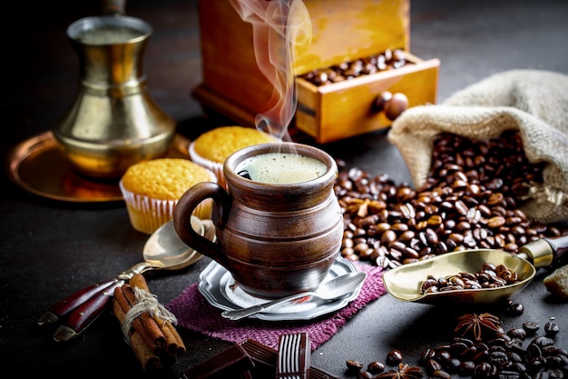 Coffee in a cup on an old table.