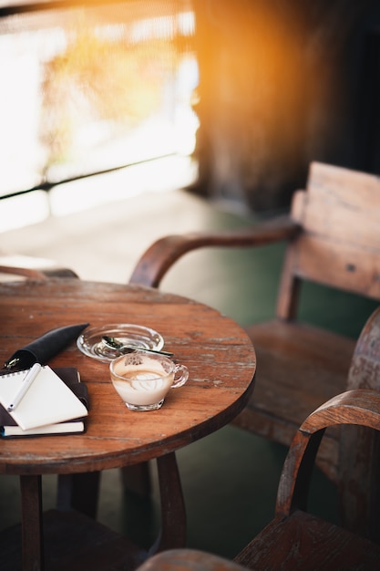 Coffee cup on rustic wood table