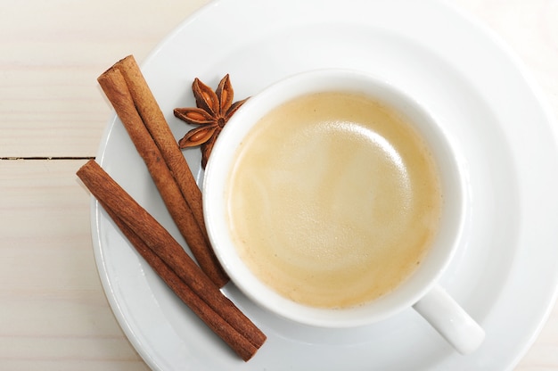 Coffee Cup and saucer, cinnamon and star anise 