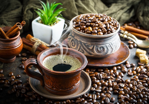 Coffee in a cup and saucer on an old.