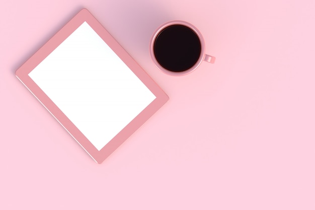 Coffee cup with tablet on pink