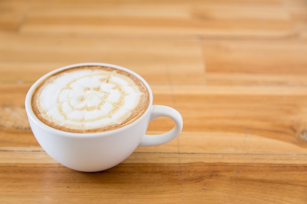 coffee cup on wood table