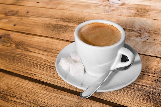 Coffee cup  on wooden background