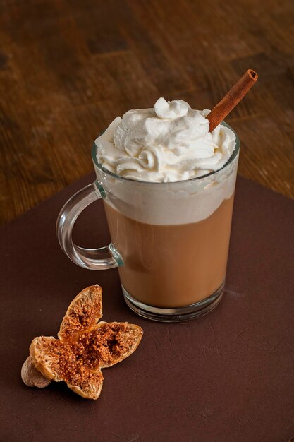 Coffee in glass cup with whipped cream