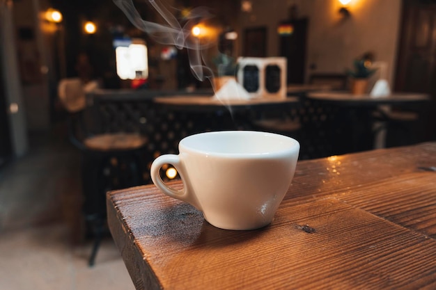 Coffee latte art on wood desk in coffee shop cafe