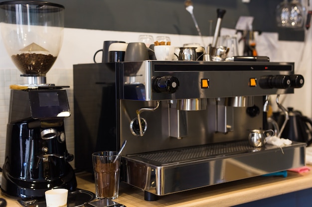 Coffee machine in coffee shop. Drinks and coffee house concept.