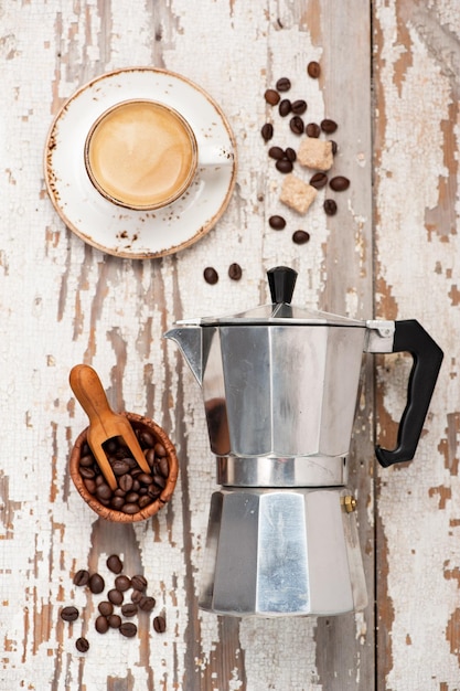 Coffee maker and cup coffee Top view