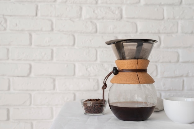 Coffee maker machine on table