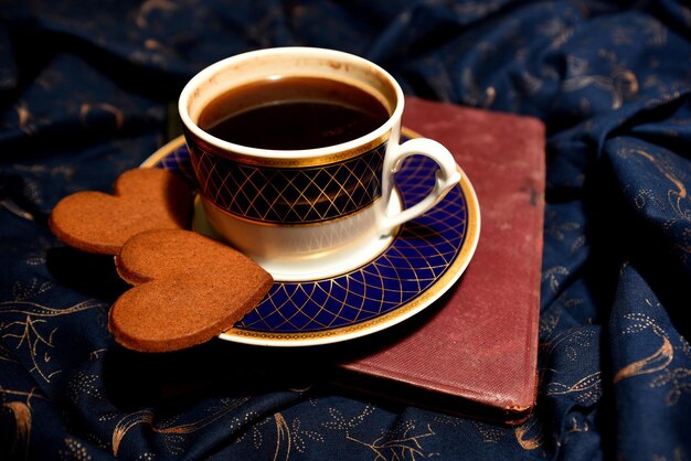 Coffee mug on the background of the wrinkled cloth