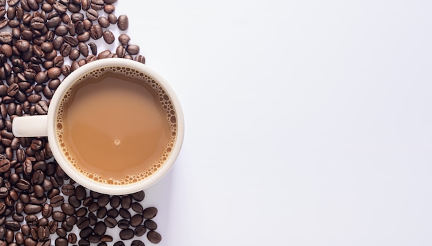 Coffee mug, coffee beans, white background scene