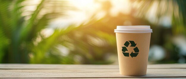 Photo coffee in paper with recycle sign cup nature background