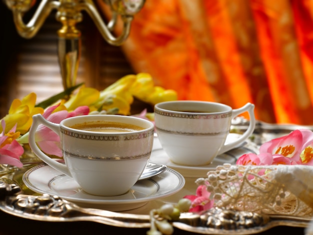 coffee poured into the cup, elegant environment