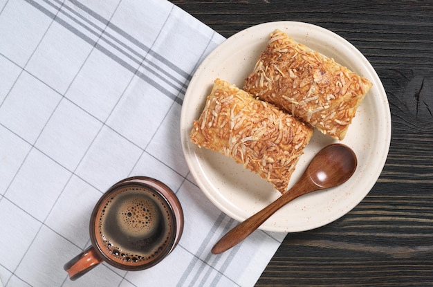 Coffee and puff pastry cookies with cheese