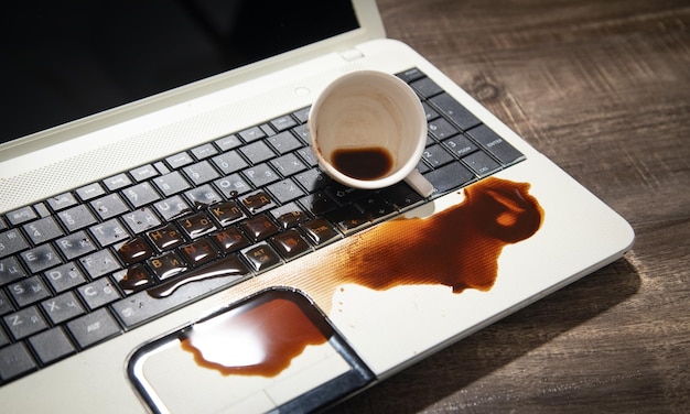 Coffee spilled over laptop keyboard