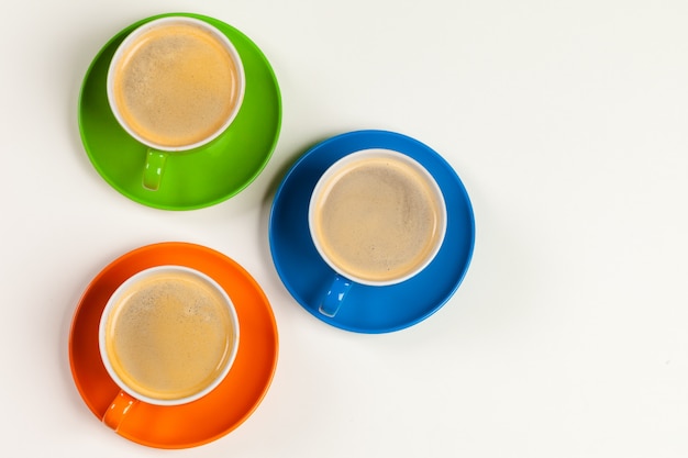 Coffee time. Bright colored composition of coffee cups