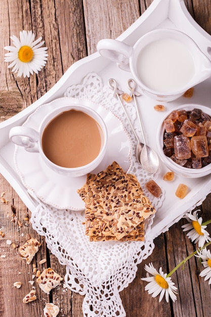 Coffee with milk and cookies .Healthy Summer Breakfast.