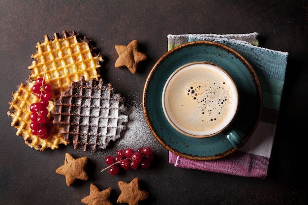 Coffee with waffles and sweets