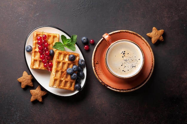 Coffee with waffles and sweets