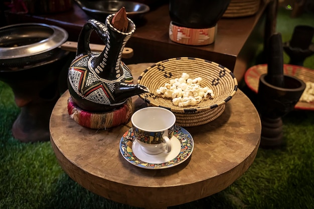 Coffeepot and a coffee mug Drinking coffee in Arabic style Coffee house