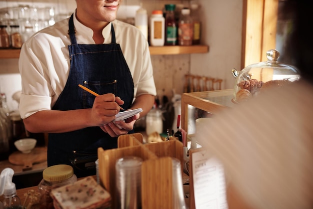 Coffeeshop Waiter Accepting Order