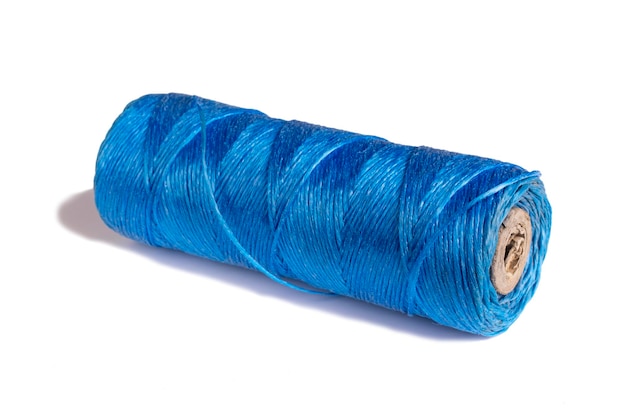 Coiled nylon rope isolated on white background Blue rolled nylon rope isolated A coil of new rope