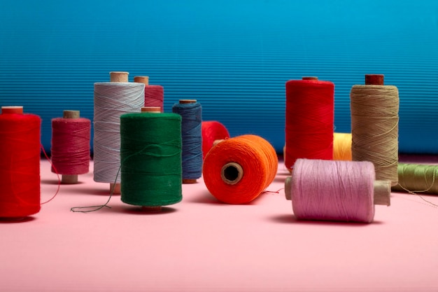 Coils with colored threads on a colored background