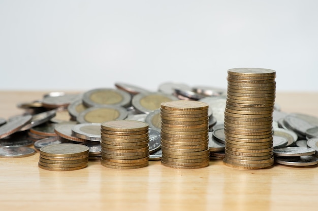 coin stack on top wood table