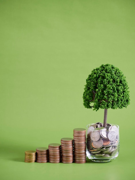 Coin stacks on green background