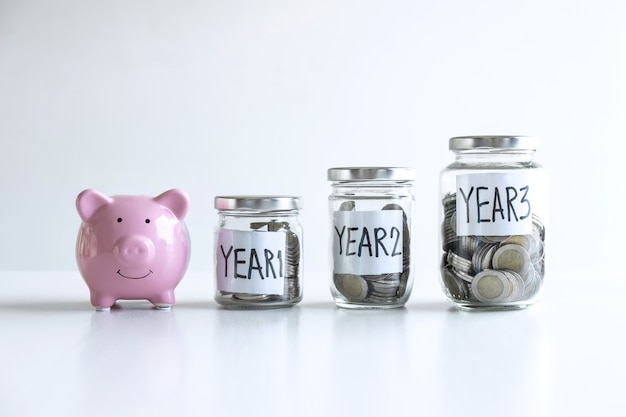 coins in different sizes jars