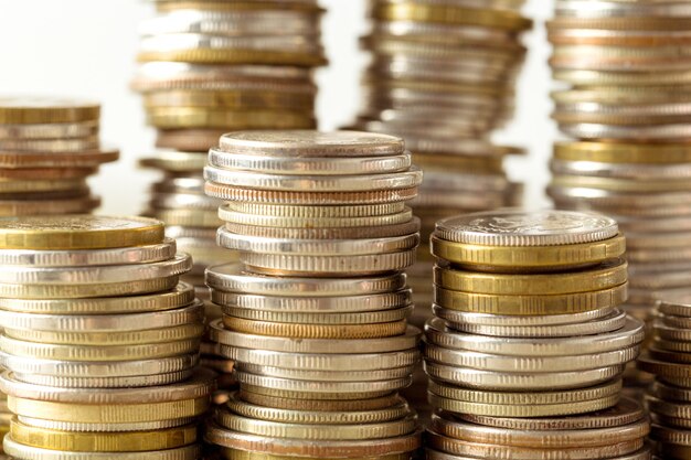 Coins stack on wooden table