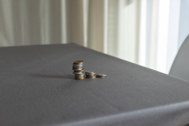 Coins on the table going up and down