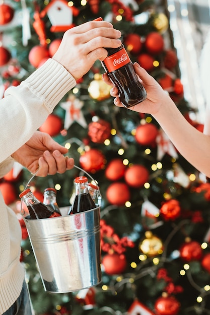 Cola in glass bottles. Christmas celebration.