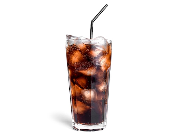 Cola with ice in a transparent glass isolated.