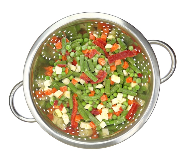 Colander with frozen mixed vegetables isolated on white