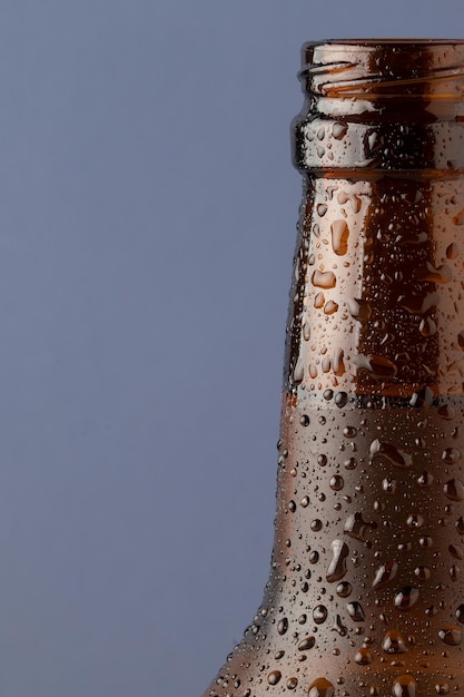 Cold bottle of beer close up