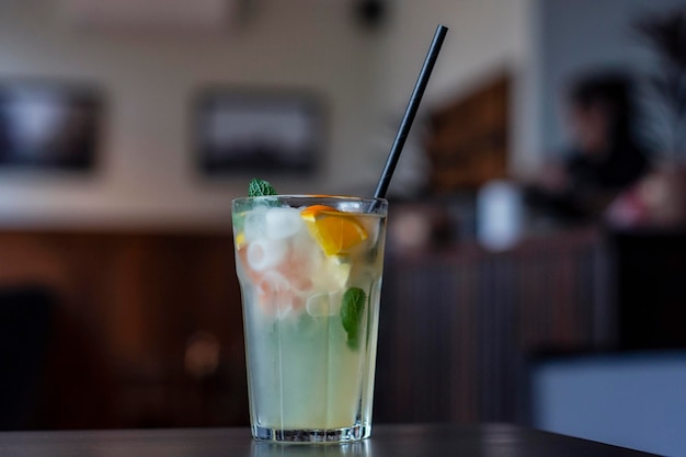 Cold drink from fresh fruits with ice in a coffee shop