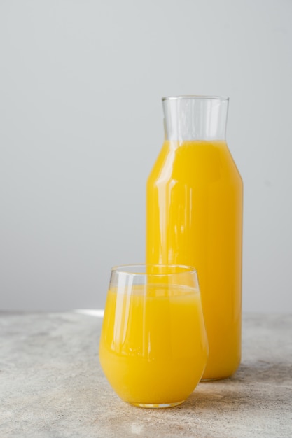 Cold fresh orange juice filled in glassware, full of vitamins